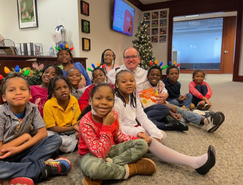 Superintendent Eric Gordon with 1st grade students from Bolton PK-8 School at CMSD Headquarters